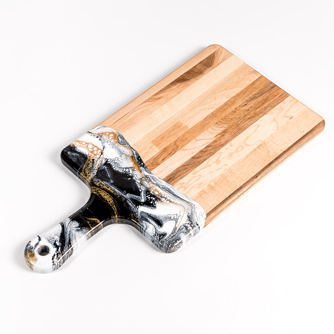 Acacia Resin Cheeseboard in black white and gold.