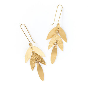 Chameli earrings are gold color with leaf shape, drop earrings on white.