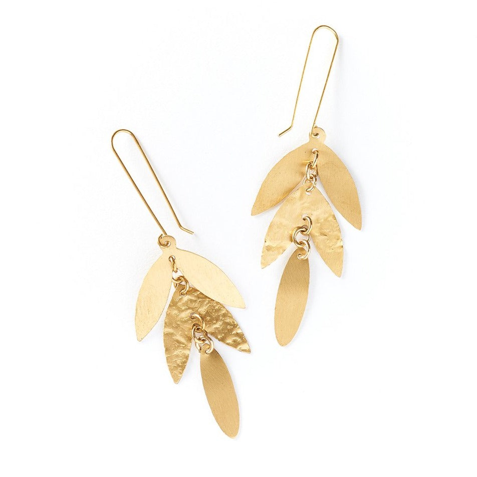 Chameli earrings are gold color with leaf shape, drop earrings on white.